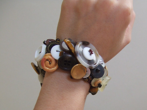 Arm with upcycled button bracelet