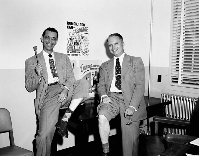 1951 HAYNES AND SCHUMAN WITH SECURITY POSTERS