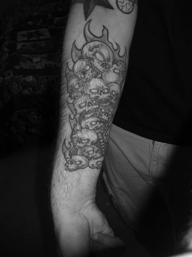 Flaming pile of skulls Drawn and tattooed by Big Mike