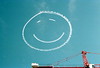Smiley face written in the sky during the inauguration of Governor Bob Martinez by State Library and Archives of Florida