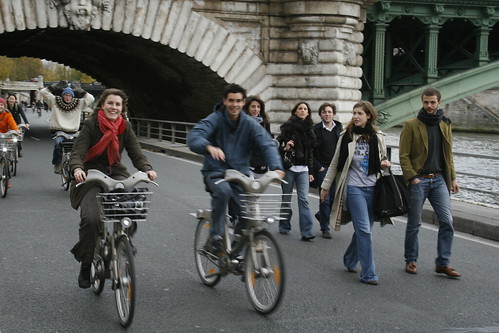people on bikes on carfree seine