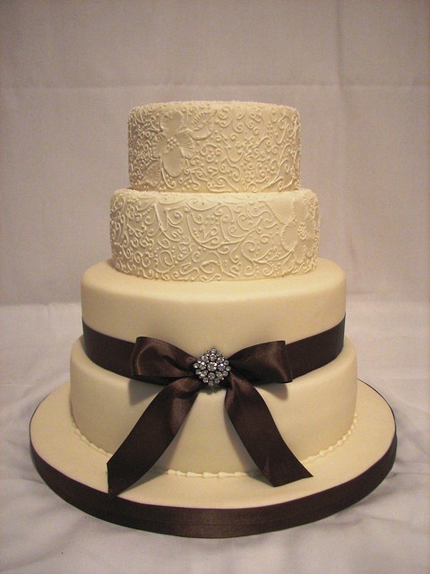 ivory and brown wedding cake by cakeladycakes