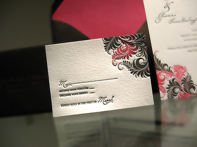  wedding invitations feature interleaving flourishes in chocolate brown 