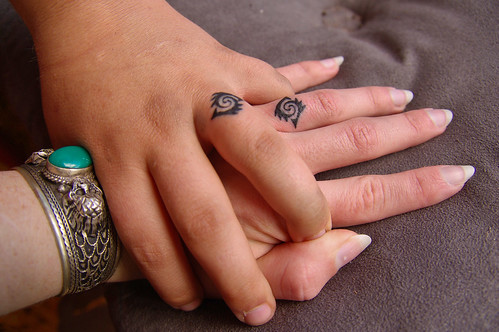 We got our wedding ring tattoos today We came up with the pattern last 