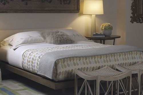 Warm, modern bedroom: Upholstered platform bed + Orly Keily linens ...