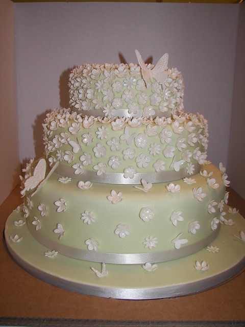 Beautiful cake with approx 500 hundred flowers and butterflies