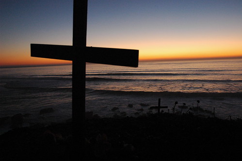 Cross, cross and rocks, sunset, Bodhisattva Beach, north of Mavericks, waves roll in, California coast, USA by Wonderlane