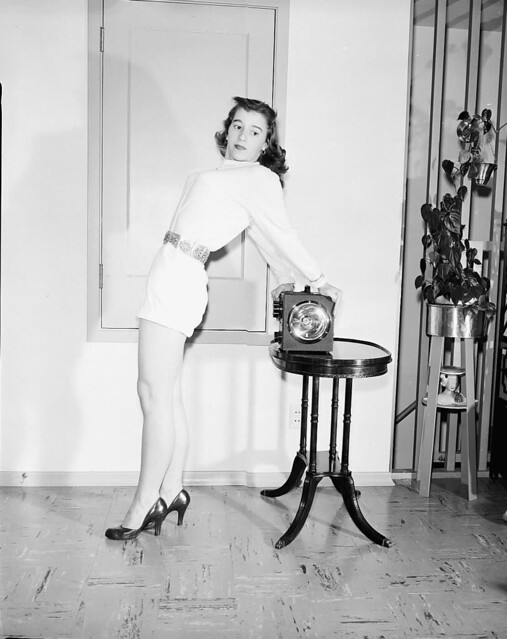 1953, INSTRUMENT SHOW PUBLICITY WITH MYRA MCMILLIAN - POSING WITH INSTRUMENT AT MR. SNORF'S HOUSE