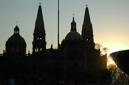 A view of Guadalajara Cathedral and Fountain at sunset, water splashing joyfully in the setting sun, Guadalajara, Jalisco, Mexico by Wonderlane