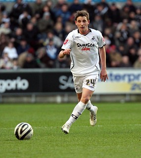 Joe Allen in action for Swansea City.