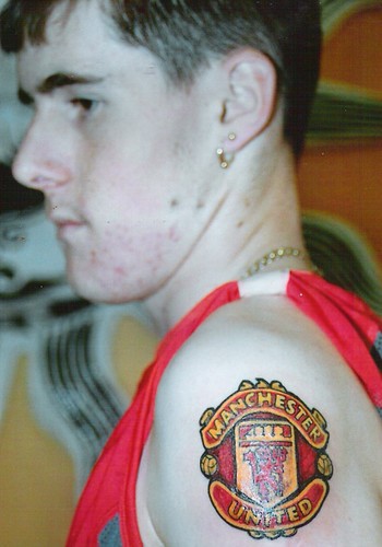 manchester united football club crest tattoo