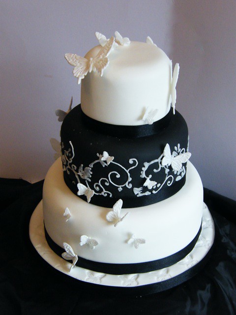 Black and white tiered butterfly wedding cake by Curly Sue Cakes