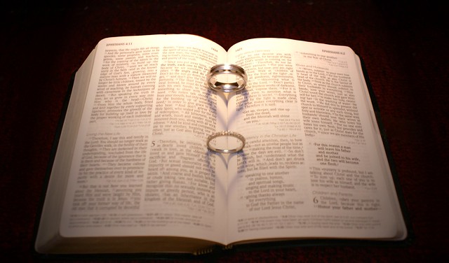 This is our wedding rings placed in the bible opened to Ephesians 5 which 
