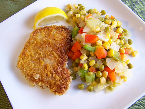 Asiago-Crusted Pork Chops with Sweet Pea and Pepper Toss