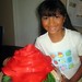 My daughter with The rose cake