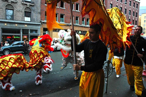 Dancing Lions, red and white - Snow Lion as the Dragon swoops by, International District, Happy Lunar New Year! Ying Yung Tong & Vovinam International Lion and Dragon Dance in Seattle Washington's International District, USA by Wonderlane