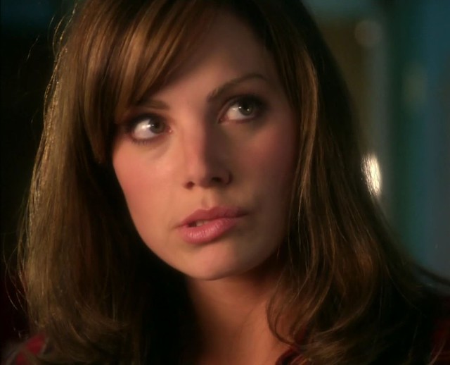 Smallville's Lois Lane Erica Durance looking damn cute biting her lip