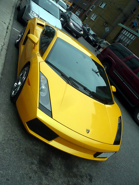 Another yellow Lamborghini Gallardo A Lamborghini Gallardo coupe parked on