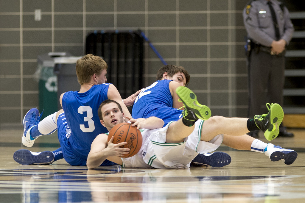 Jacob Warner comes up with a loose ball for the Dragons.