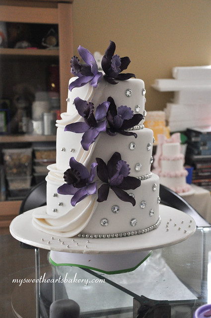 3 tier wedding cake with sugar flower purple orchids