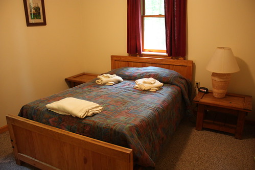 One double bed in one of the bedrooms in cabin 29.