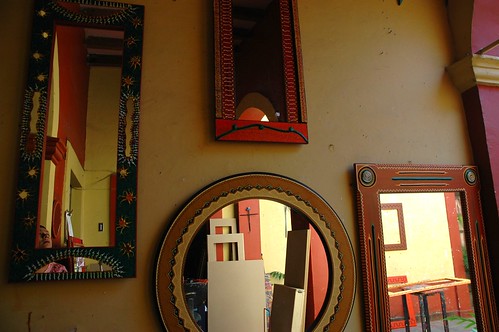 Hand painted wood hallway mirrors, modern Mexican style, with Rossy looking up, Mexique, Zona Centro, Guadalajara, Jalisco, Mexico by Wonderlane