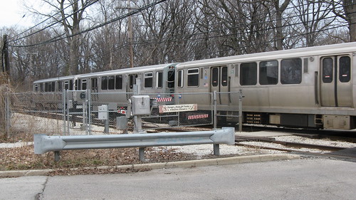 Northbound CTA Purple line train at the Isabella Street railroad crossing. Wilmette Illinois. Early March 2009. by Eddie from Chicago
