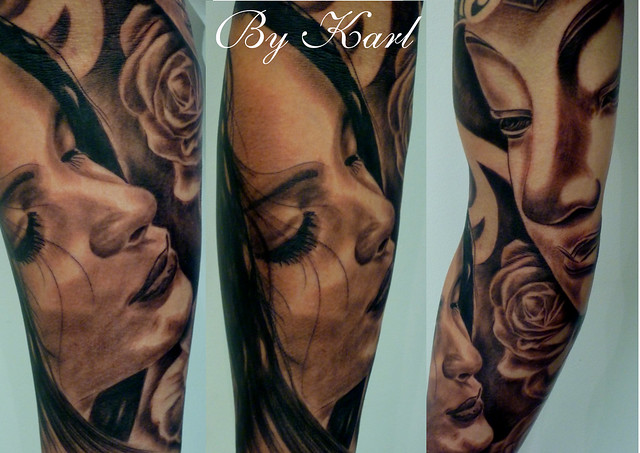 Black and grey portrait buddha rose sleeve tattoo