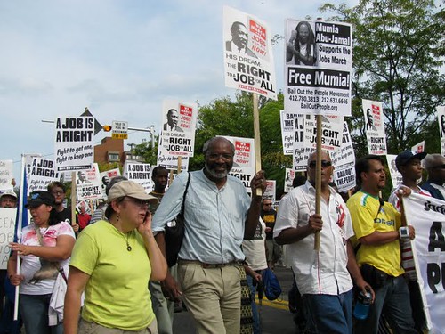 Abayomi Azikiwe, editor of the Pan-African News Wire, covering the March for Jobs in Pittsburgh on September 20, 2009. The event was held in the historic 'Hill District' and started off a week of protests surrounding the G20. (Photo: Alan Pollock) by Pan-African News Wire File Photos