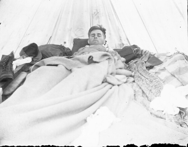 Man sleeping inside a tent