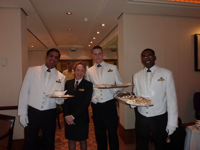 Queen Mary 2 waiters at afternoon tea