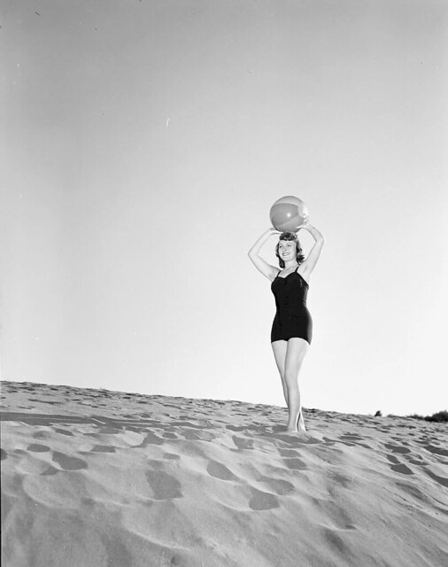 1953 WOMAN POSING IN BATHING SUIT