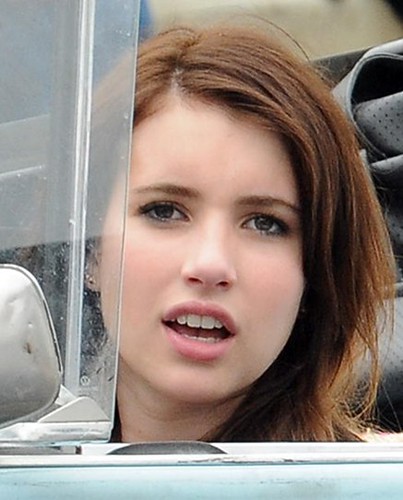  3336186 Emma Roberts gets cheeky with photographers on the set of 