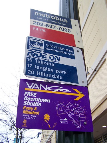 Bus stop signs, including for the Van Go, Silver Spring