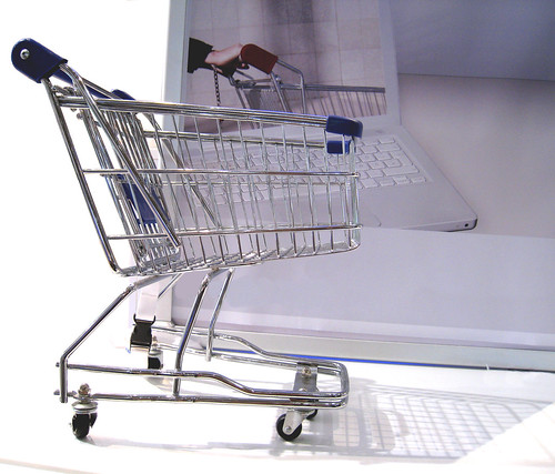 Shopping cart represents online marketplace idea