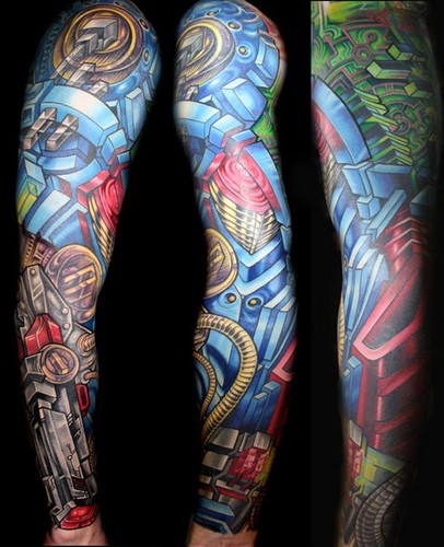 Check out the story behind this amazing robotic arm tattoo by Mike Cole