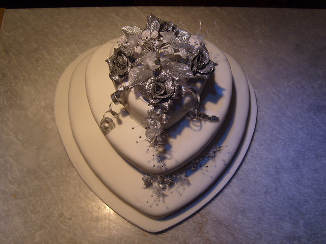 silver and white heart wedding cake Top view