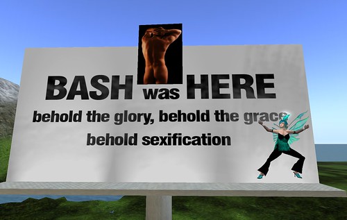 A Billboard with 'BASH was HERE. behold the glory, behold the grace, behold sexification' on it. Deoridhe Quandry, in a Teal Outfit with short teal and black hair is posed on one side gesturing upwards to the words, and a picture of Bash Quandry's offline butt is in the middle.