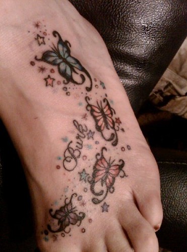 Foot Tattoo My Family Tattoo The blue butterfly is my dad the peach one 