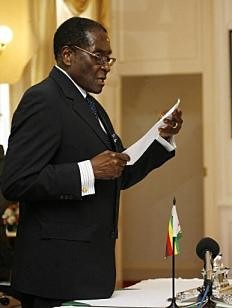 Comrade President Robert Mugabe swearing in 25 ministers of state and deputies for the inclusive government in the Republic of Zimbabwe. by Pan-African News Wire File Photos