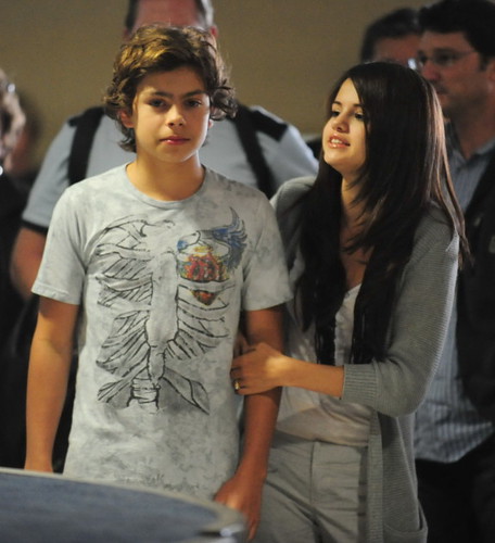 Selena Gomez And CoStar Jake Austin Stay Close At LAX