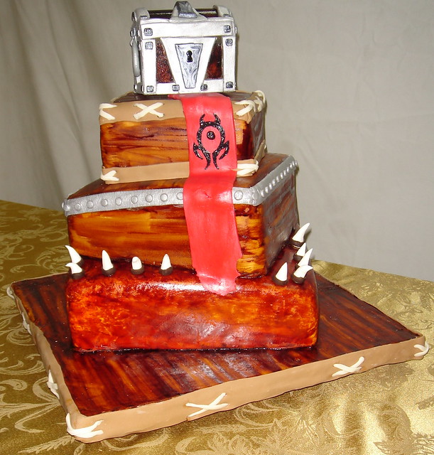 World of warcraft wedding cake with horde banner and sugar treasure chest