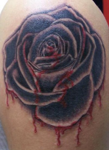 After much thought i decided to go with a bleeding black rose