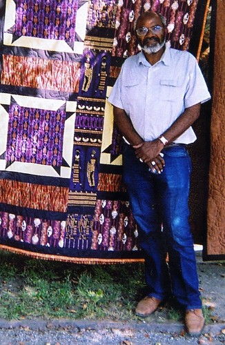 Abayomi Azikiwe, editor of the Pan-African News Wire, standing next to a quilt at the Detroit Bead Museum on the city's west side in September 2008. (Photo: Omorose) by Pan-African News Wire File Photos