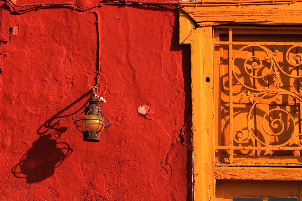 Red wall and lamp