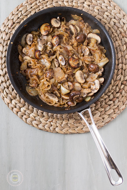 sautéed onions and mushrooms in saute pan