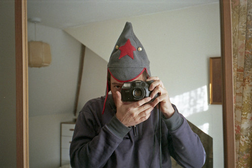 reflected self-portrait with Kenox FX-4 camera and pointy hat by pho-Tony