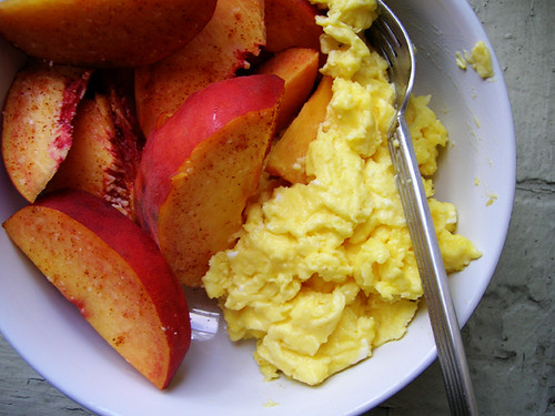 scrambled eggs and peaches with salt and cayenne
