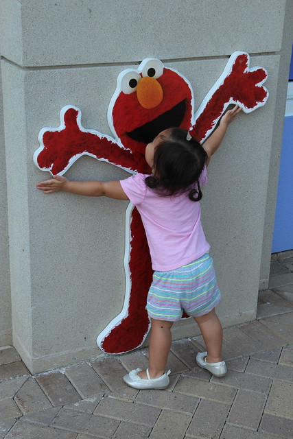 And of course, she had to give Elmo a goodbye hug...
