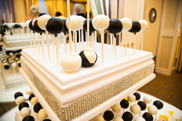 Close-up of a white cake pop stand decked out in glammy rhinestones! 